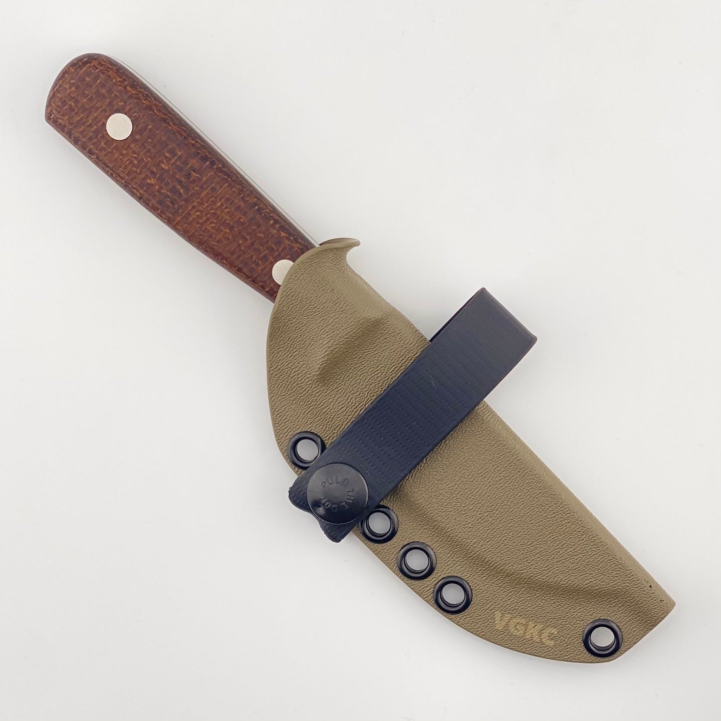 Knife with brown handle and tan sheath on a white background