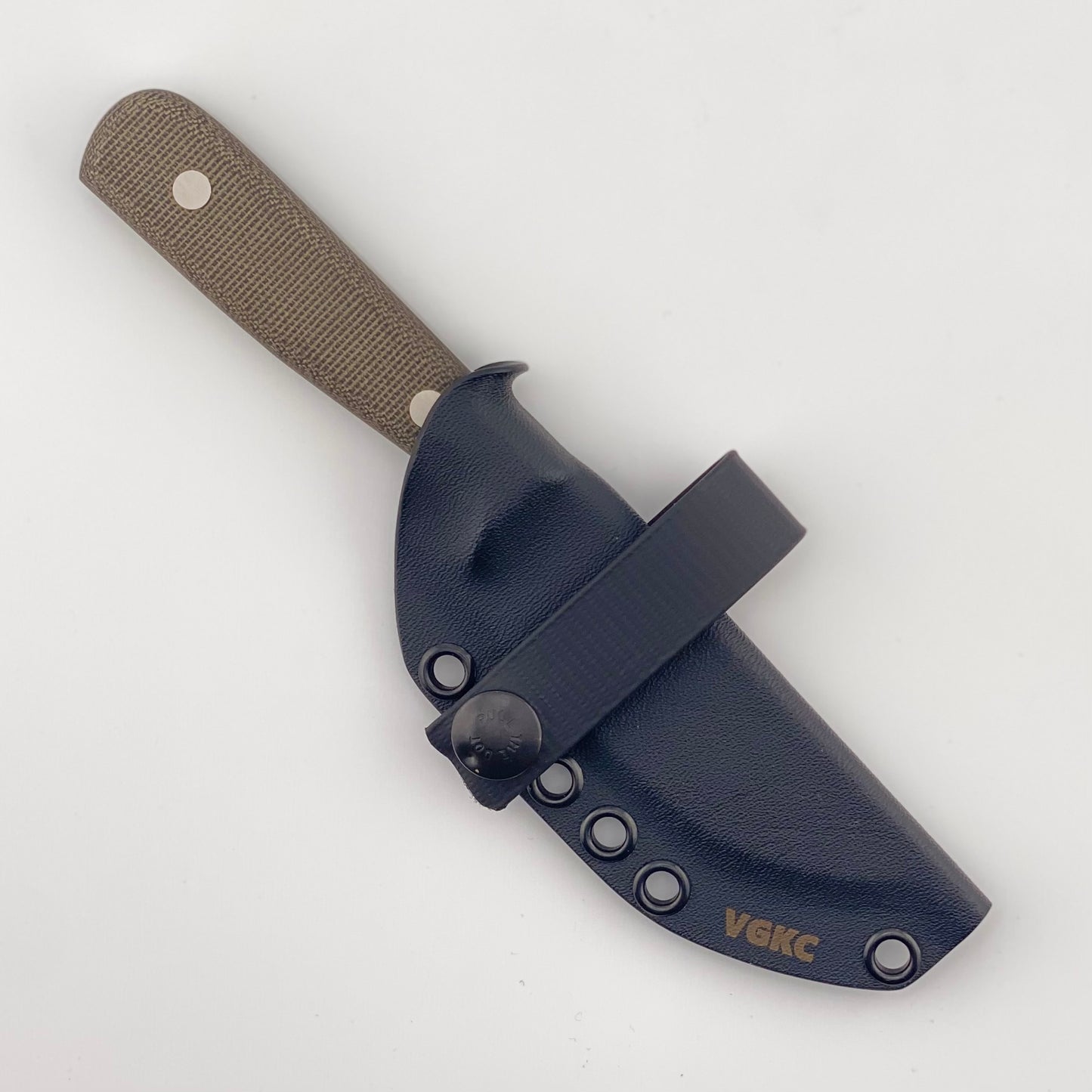 Knife with dark green handle and black sheath on a white background