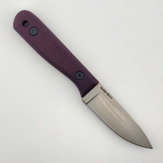 Knife with a purple handle on a white background