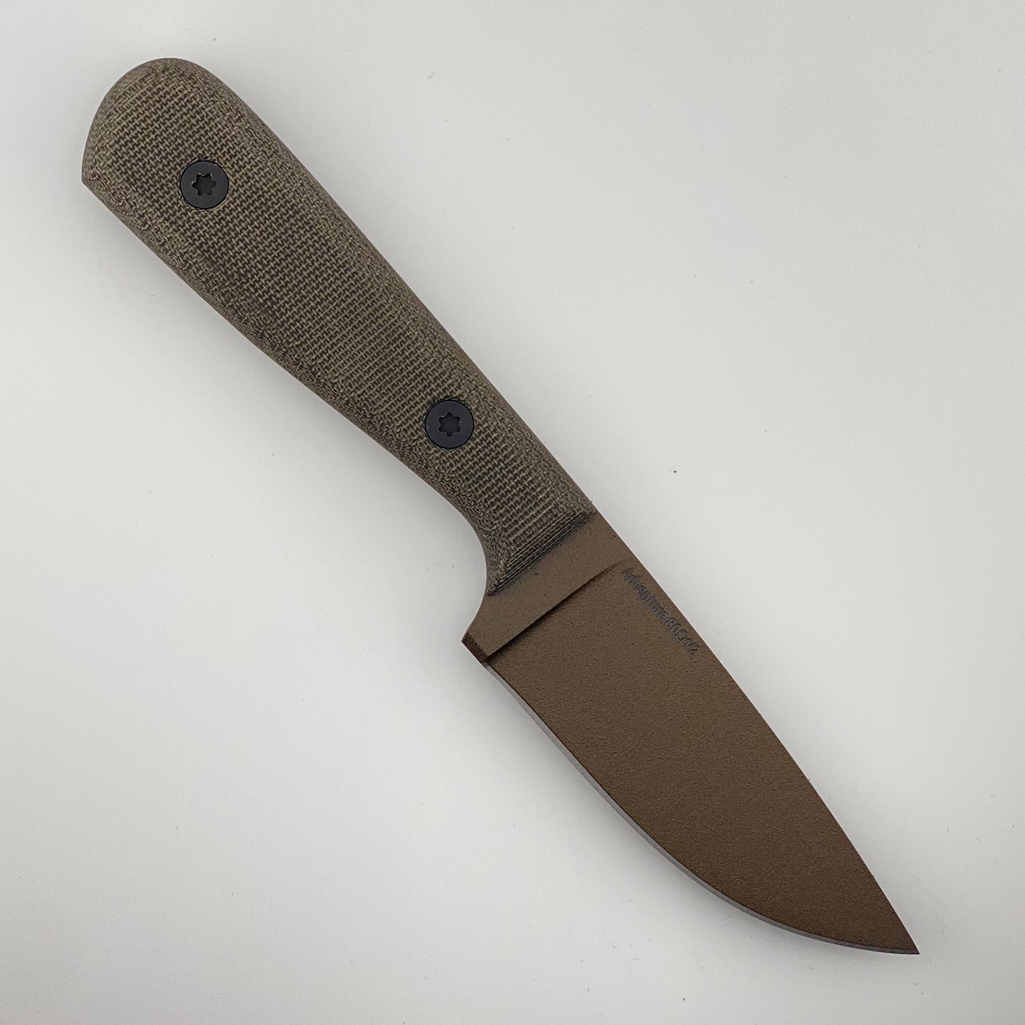 Knife with a dark green handle and a bronze blade on a white background