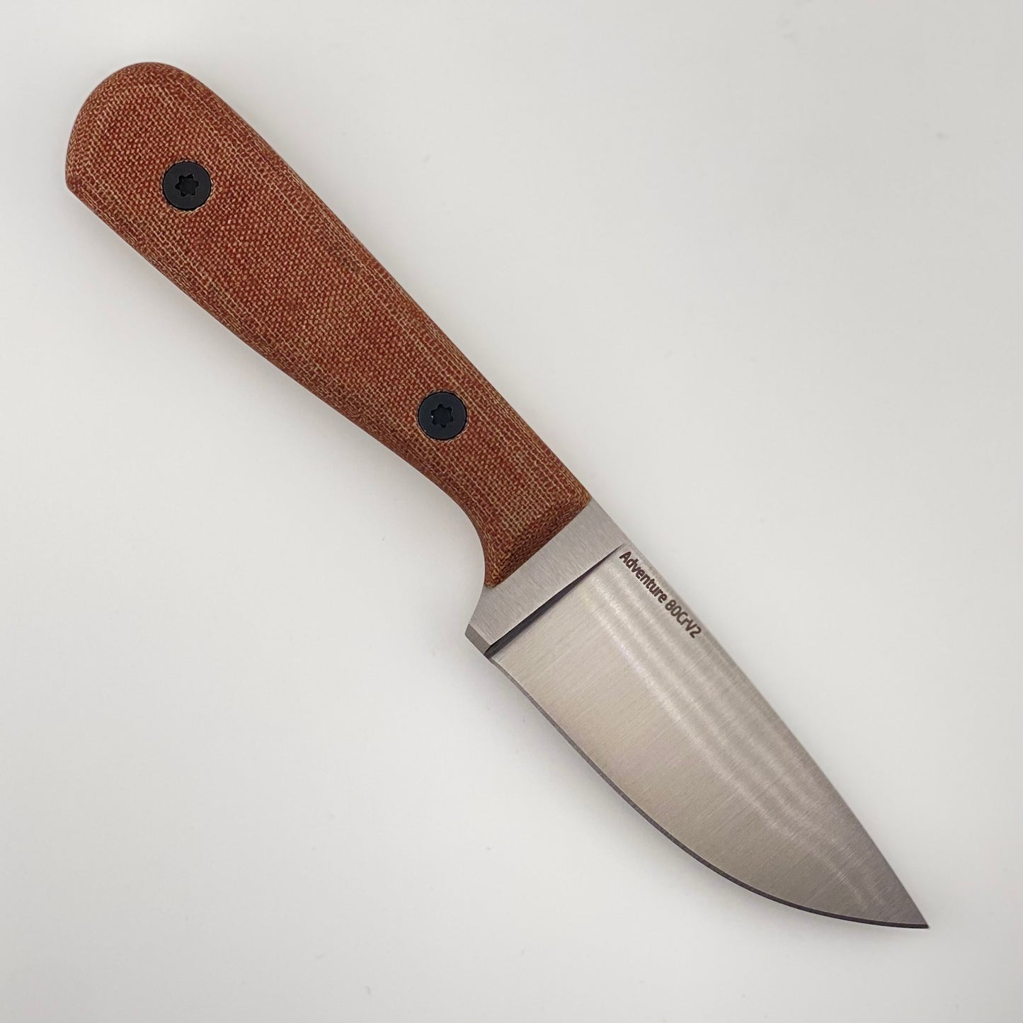 Knife with a brown handle on a white background