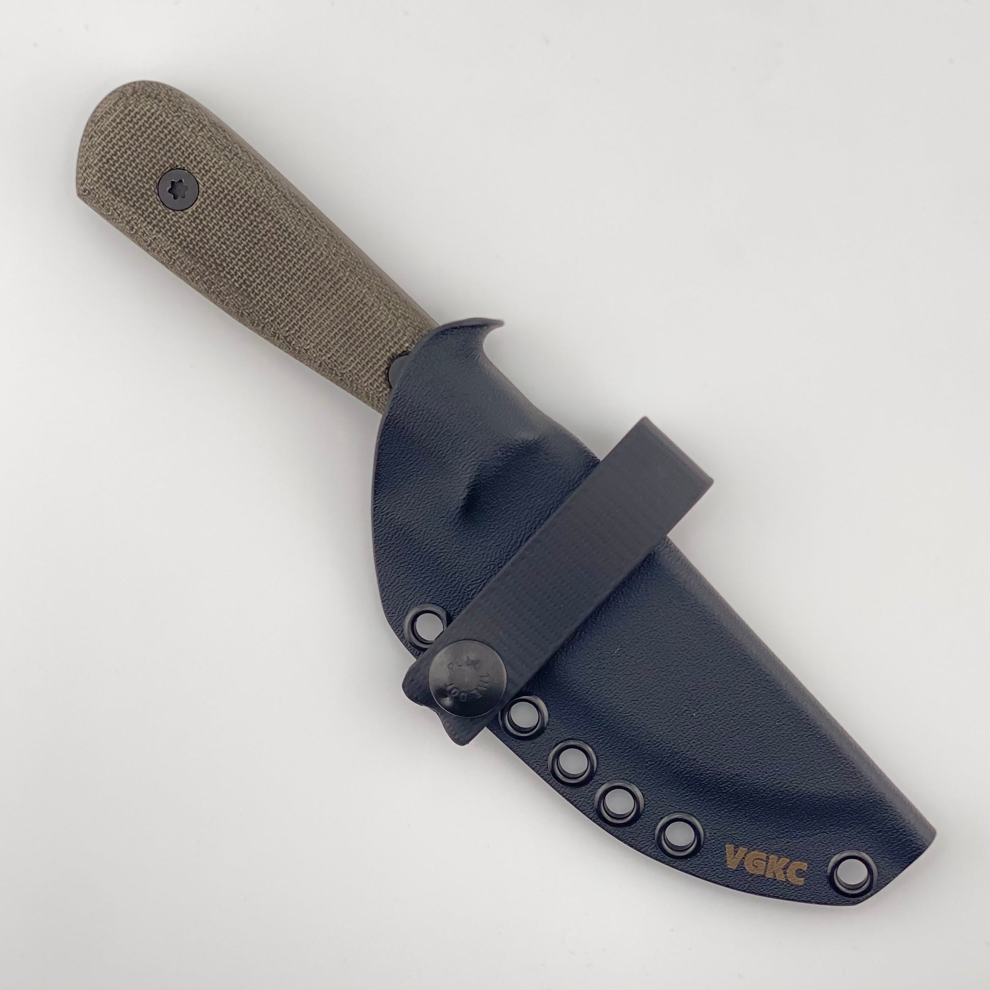 Dark green handled knife with a sheath on a white background