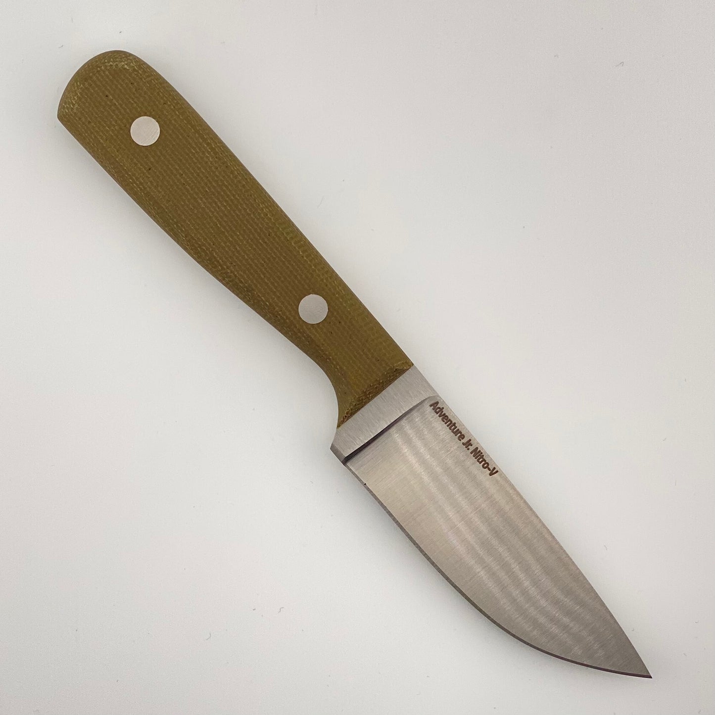 Knife with a green handle and steel blade on a white background
