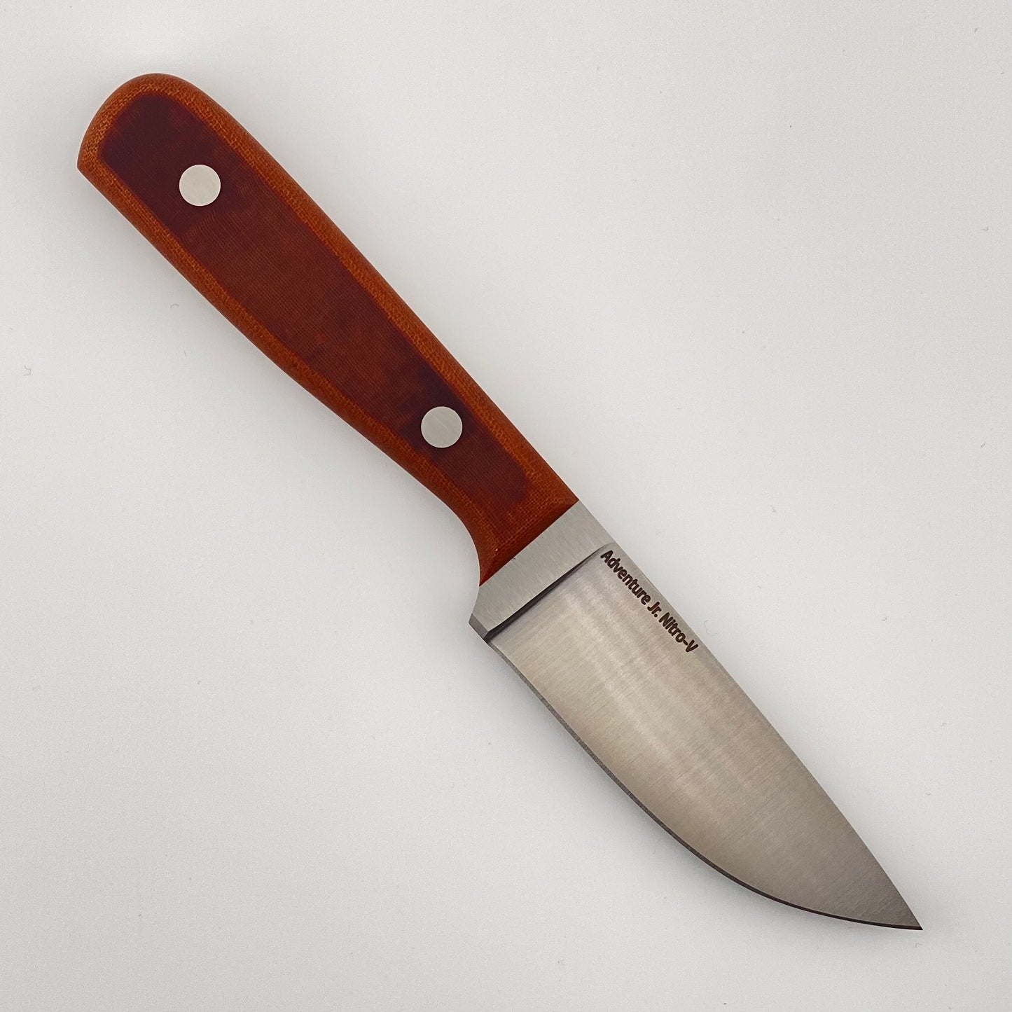 Knife with a brown handle on a white background