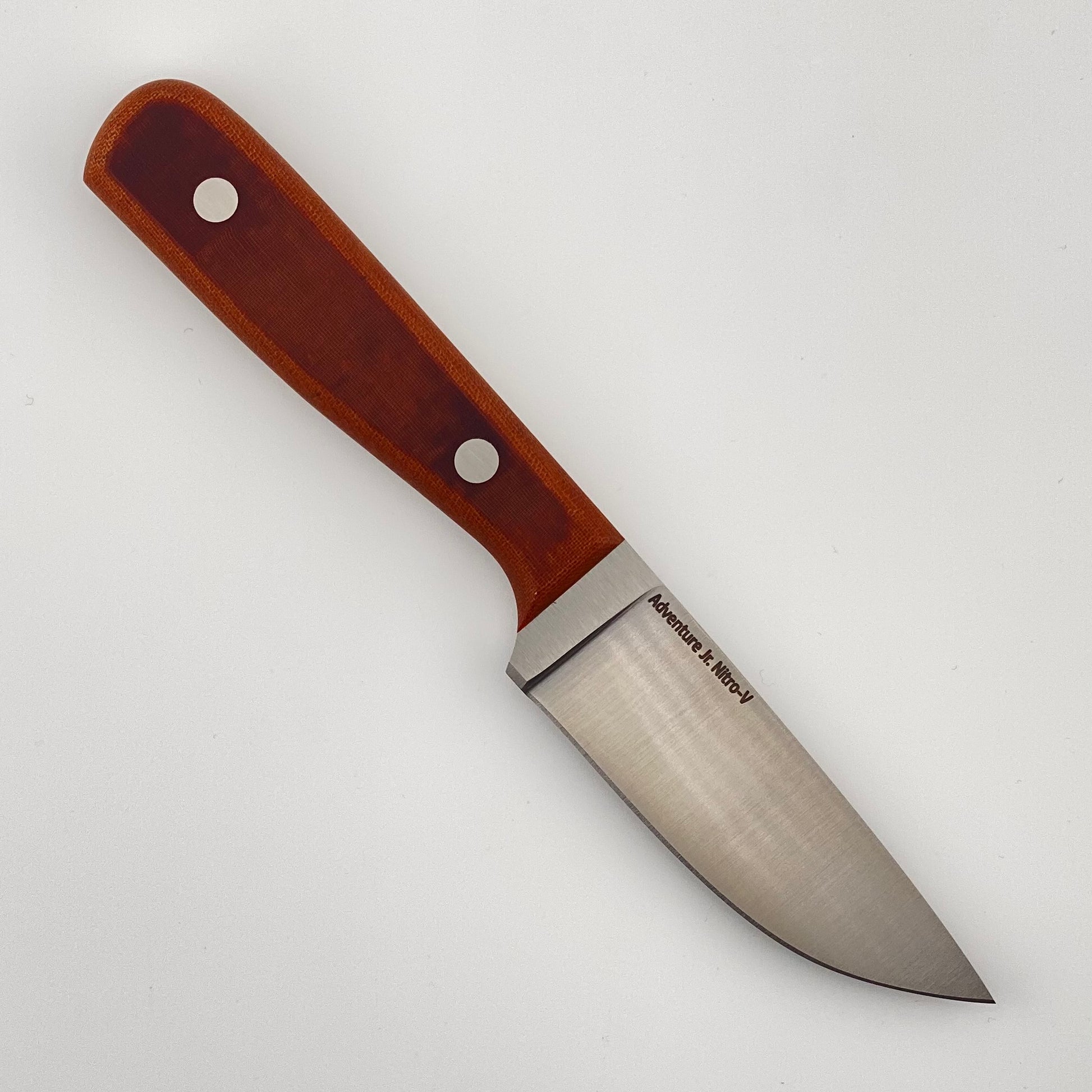 Knife with a brown handle on a white background