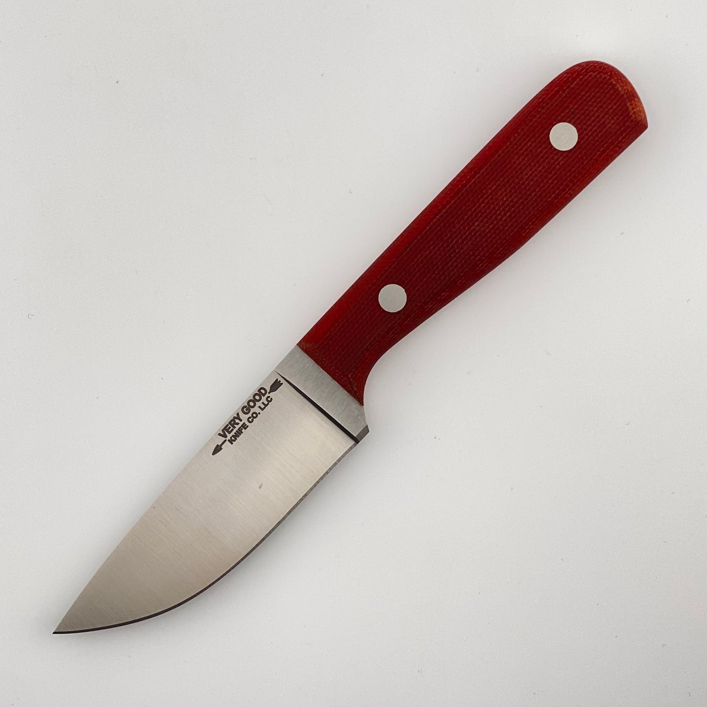 Knife with a red handle on a white background