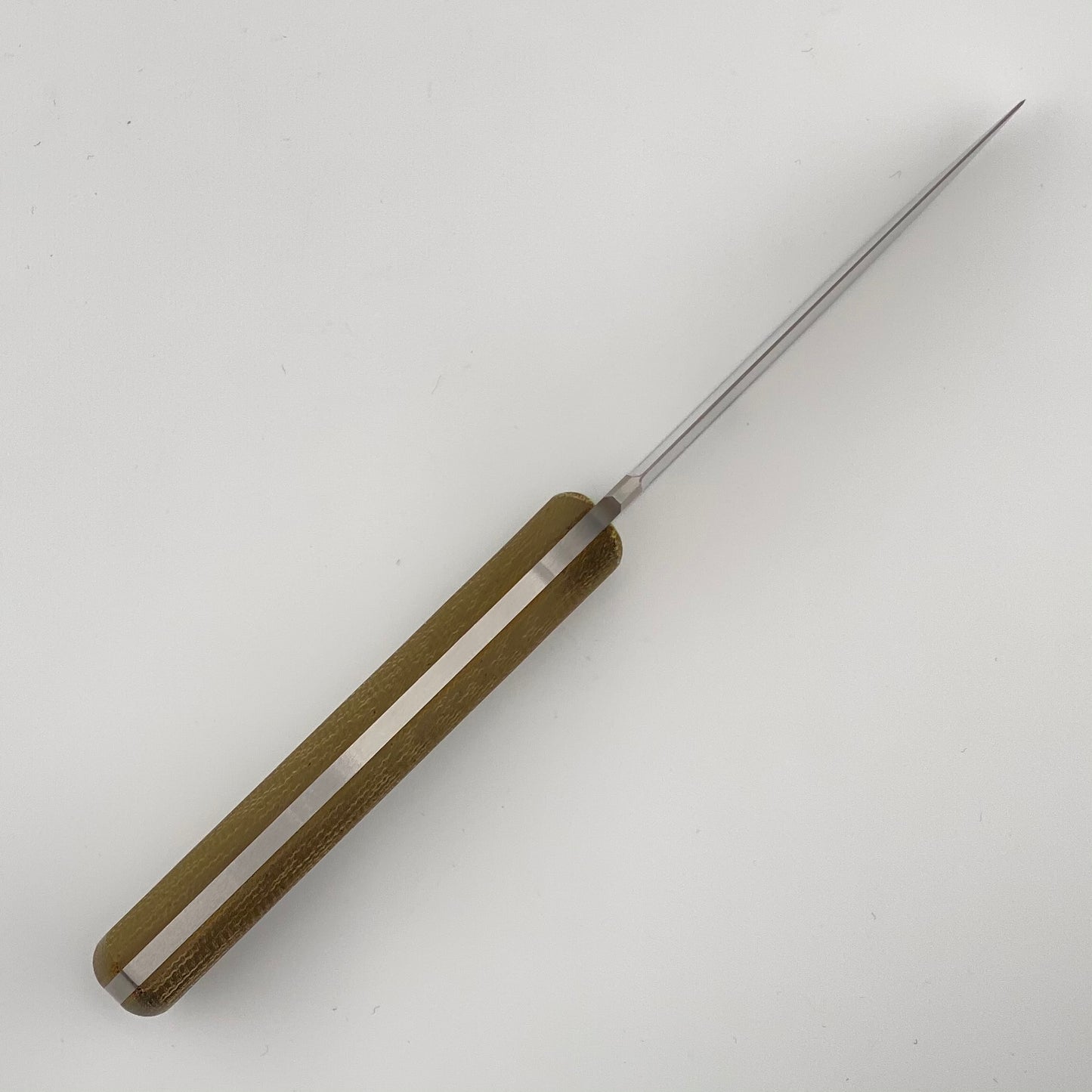 knife with green handle on a white background