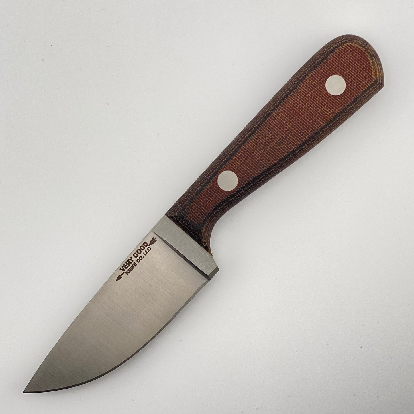 Knife with a orange and black handle on a white background