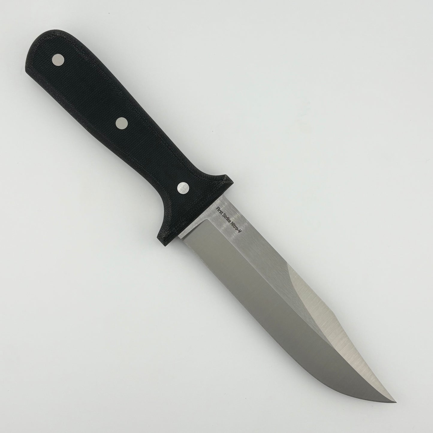 Knife with a black handle on a white background