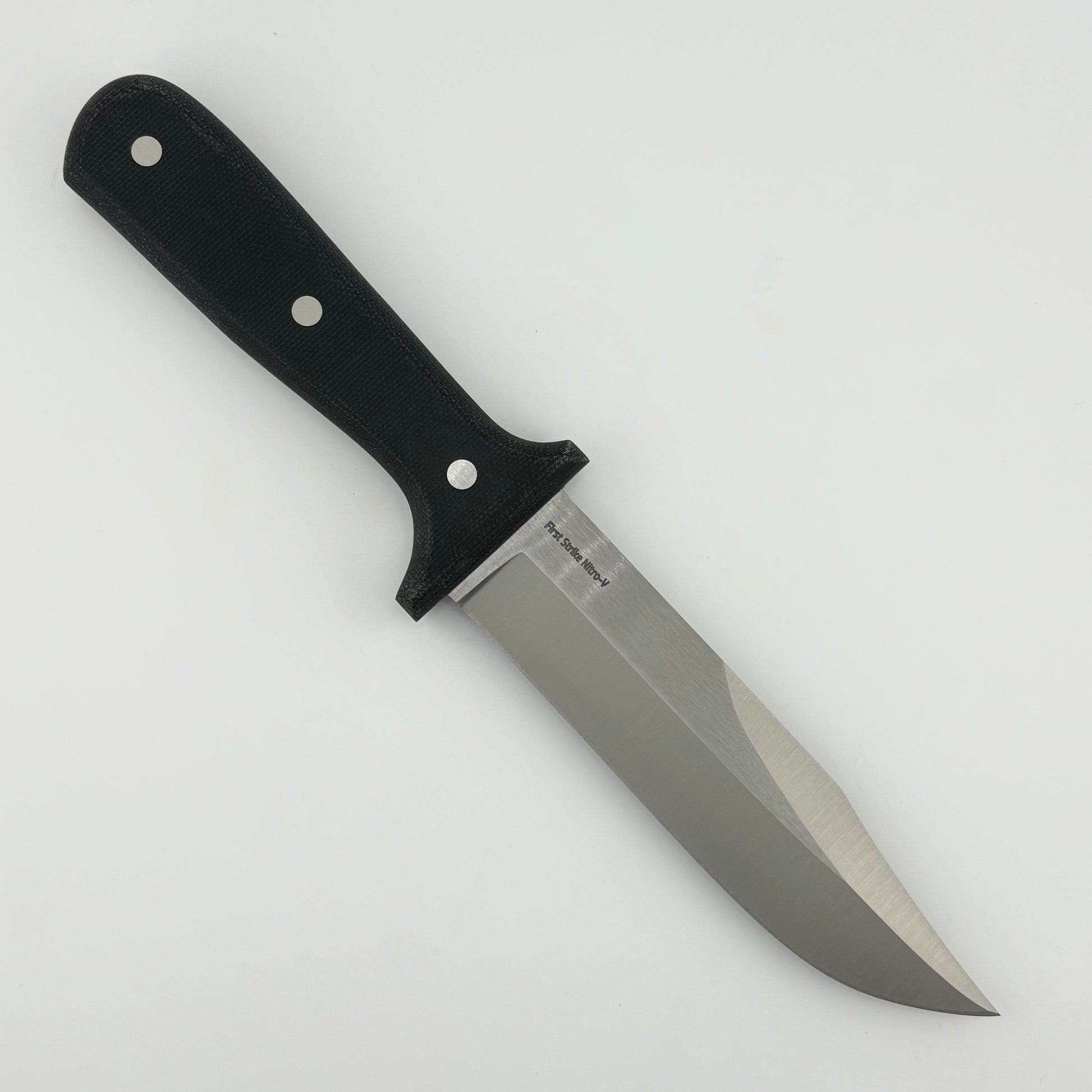 Knife with a black handle on a white background