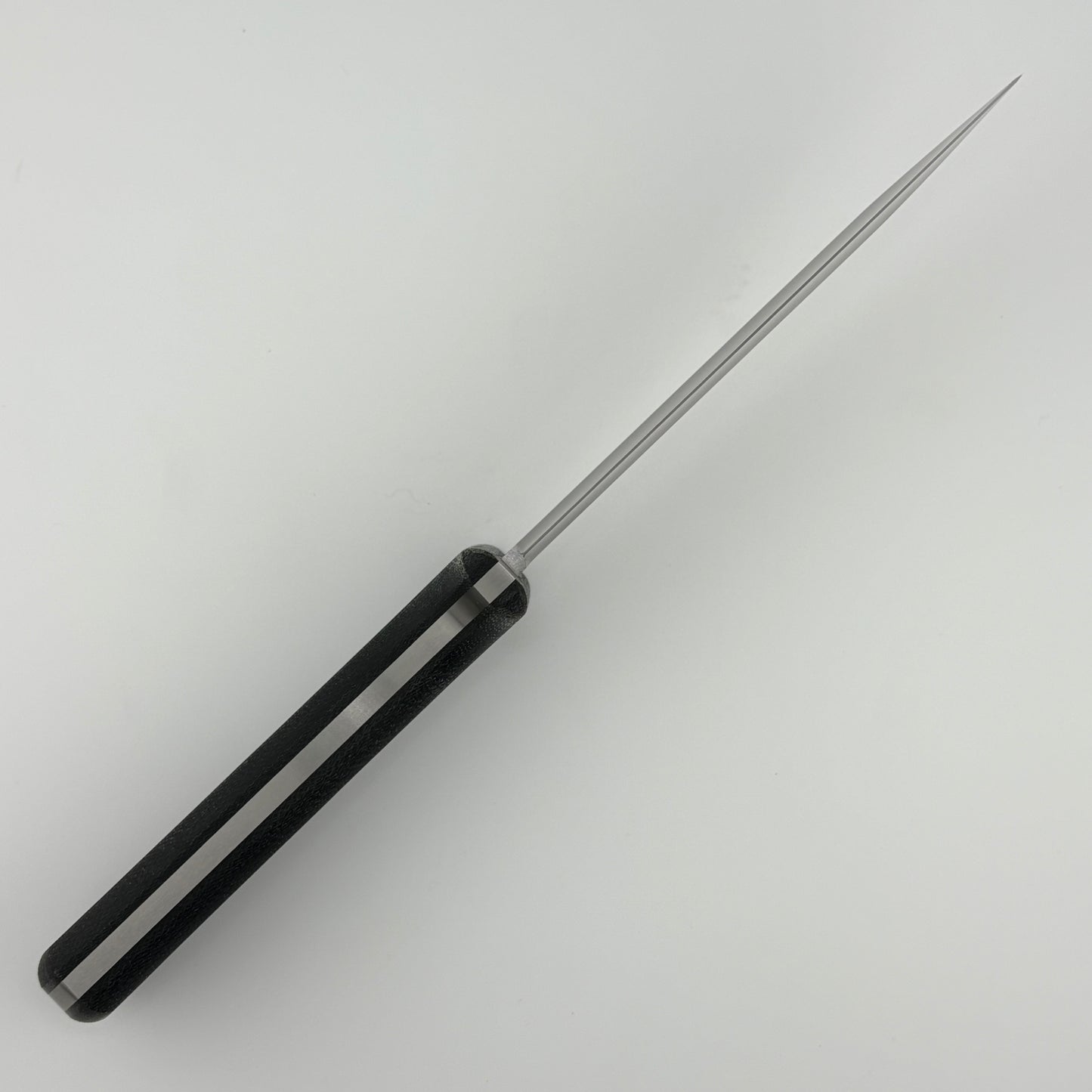 Black-handled knife on a white background