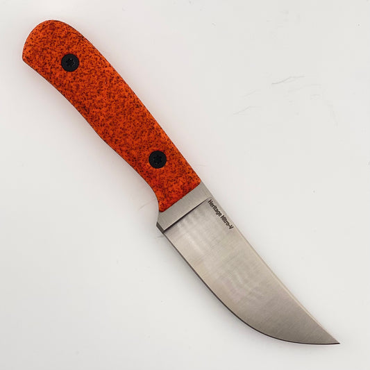 Knife with a orange handle on a white background