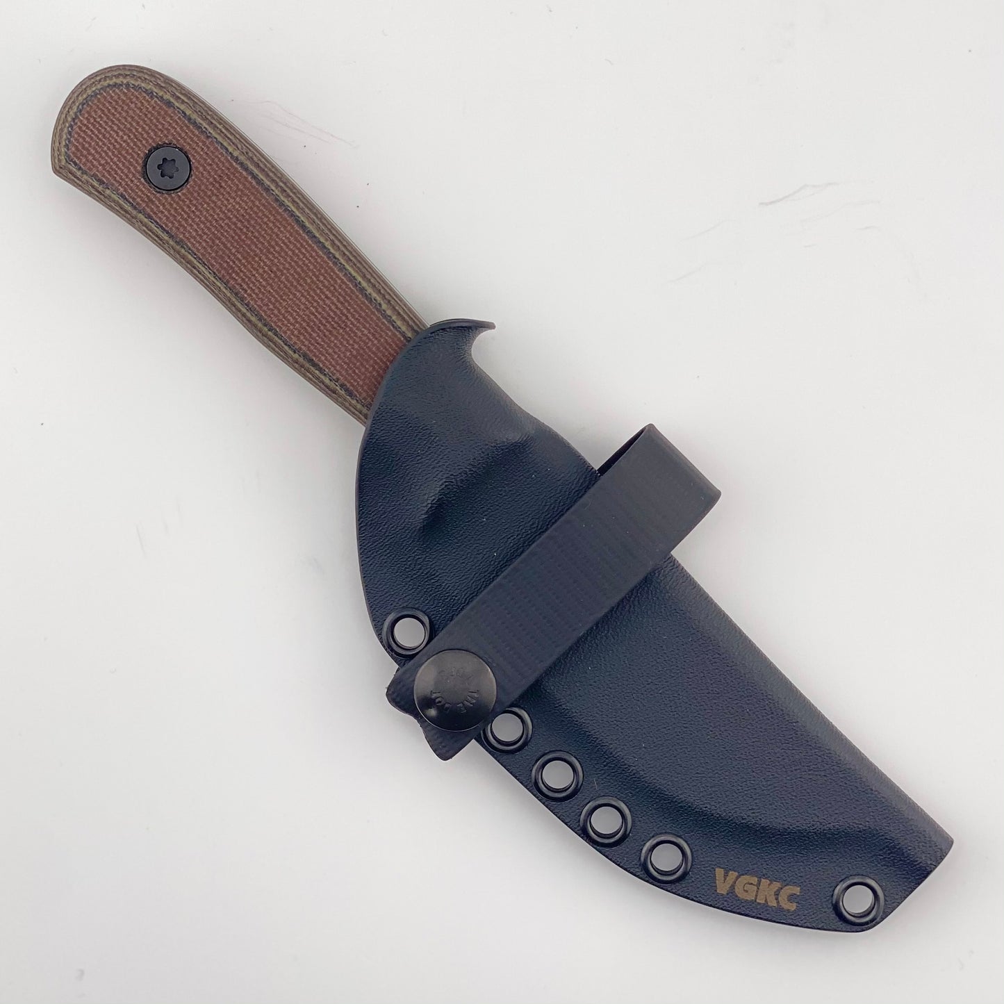 Knife with brown handle and black sheath on a white background