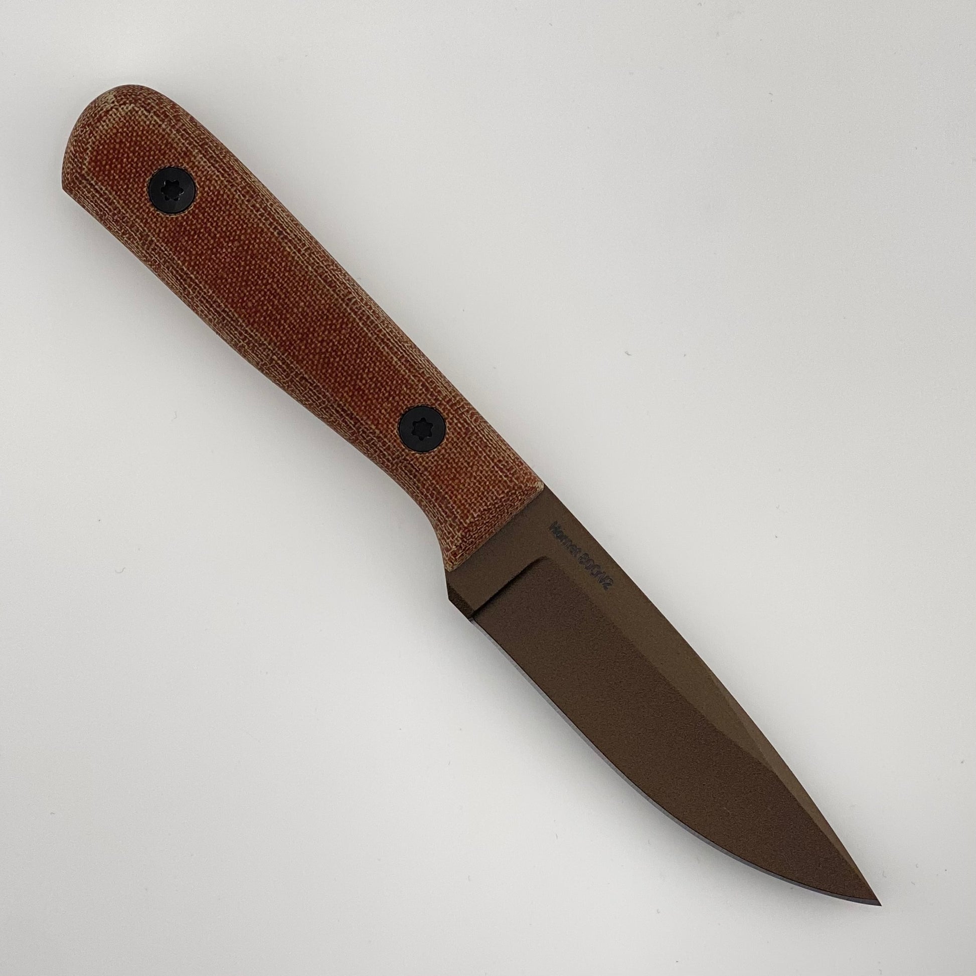 Bronze fixed blade knife with brown handles on a white background