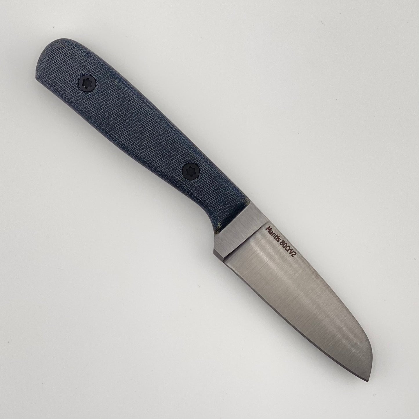 Knife with denim blue handle on a white background