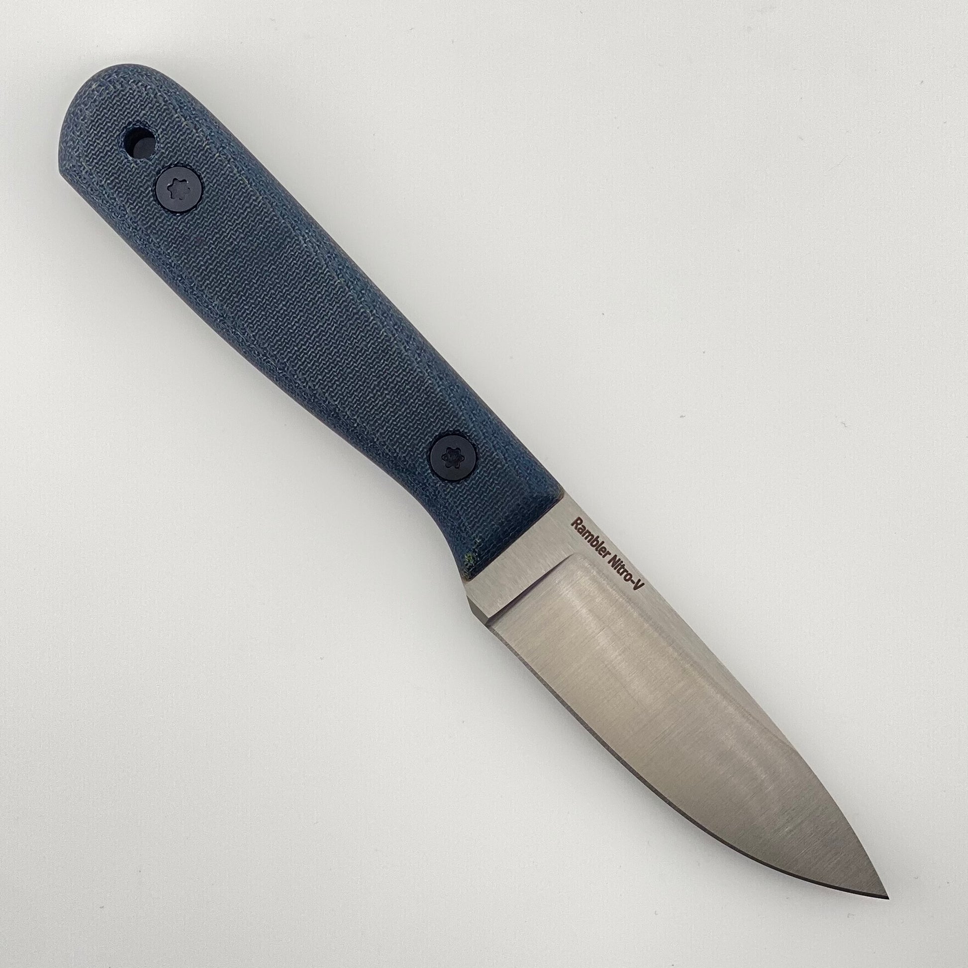 Fixed blade knife with a denim blue on a white background