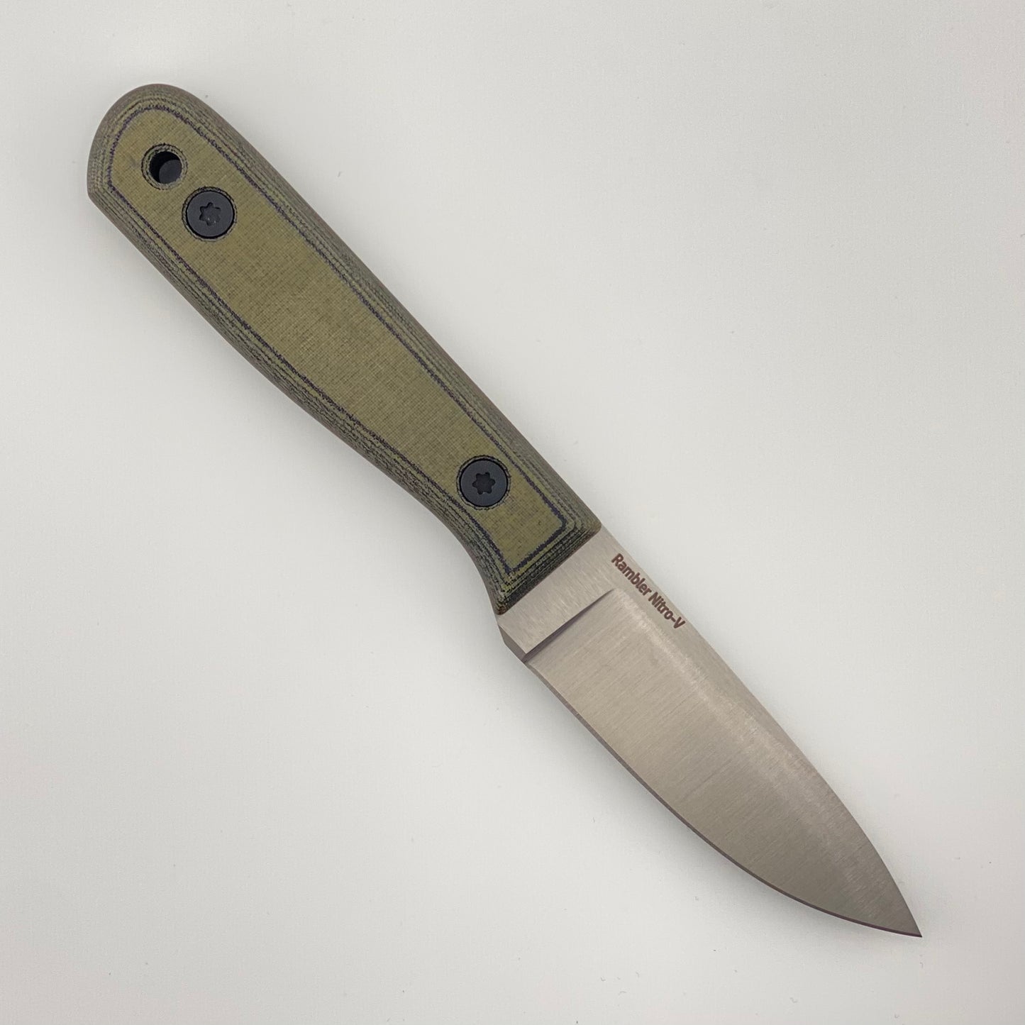 Fixed blade knife with green and black handles on a white background