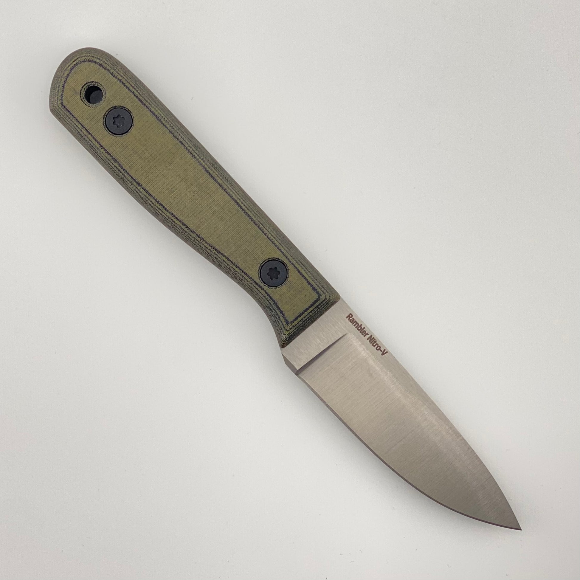Fixed blade knife with green and black handles on a white background