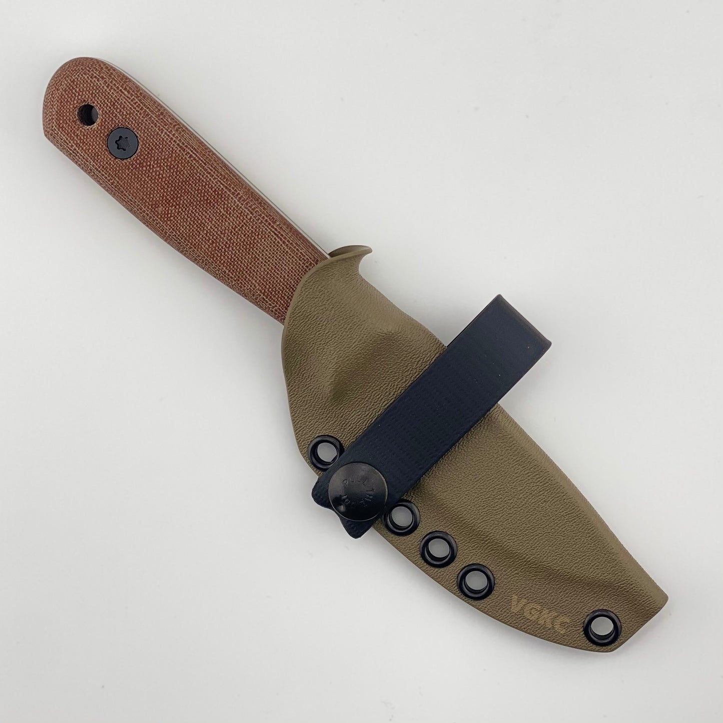 Fixed blade knife with brown handle in a tan sheath on a white background