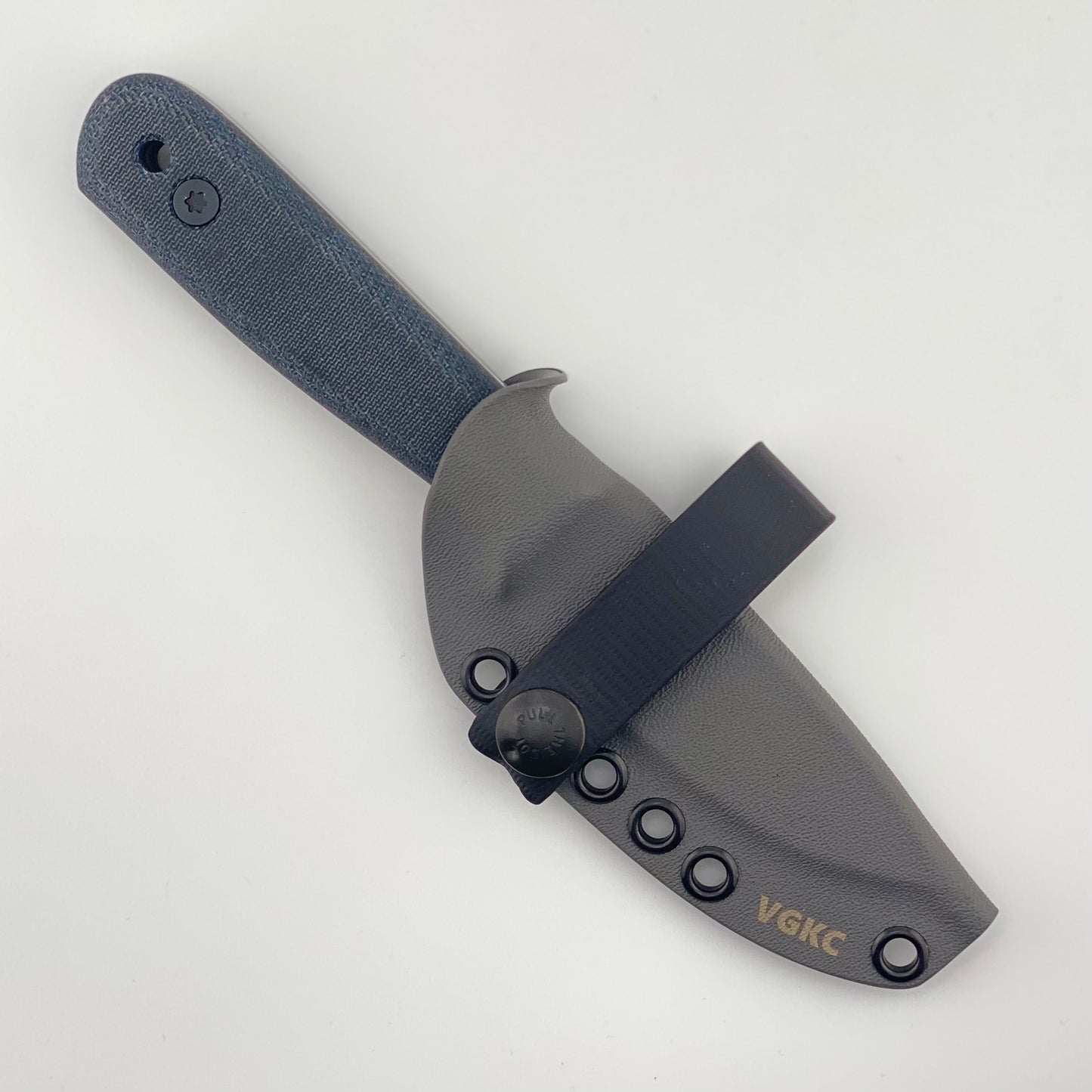 Denim blue handled knife in a gray sheath on a white background