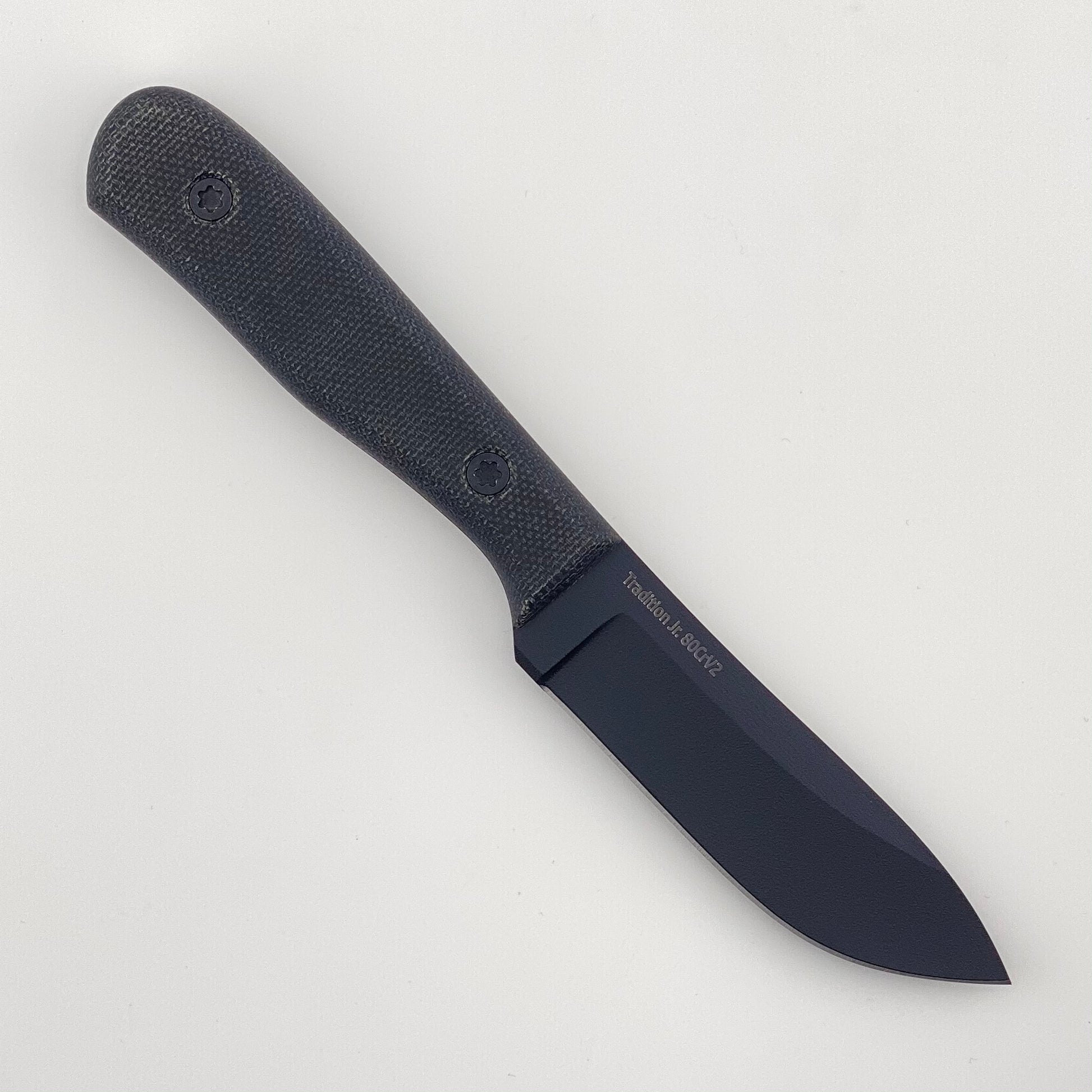 Black fixed blade knife with black textured handle on a light gray background