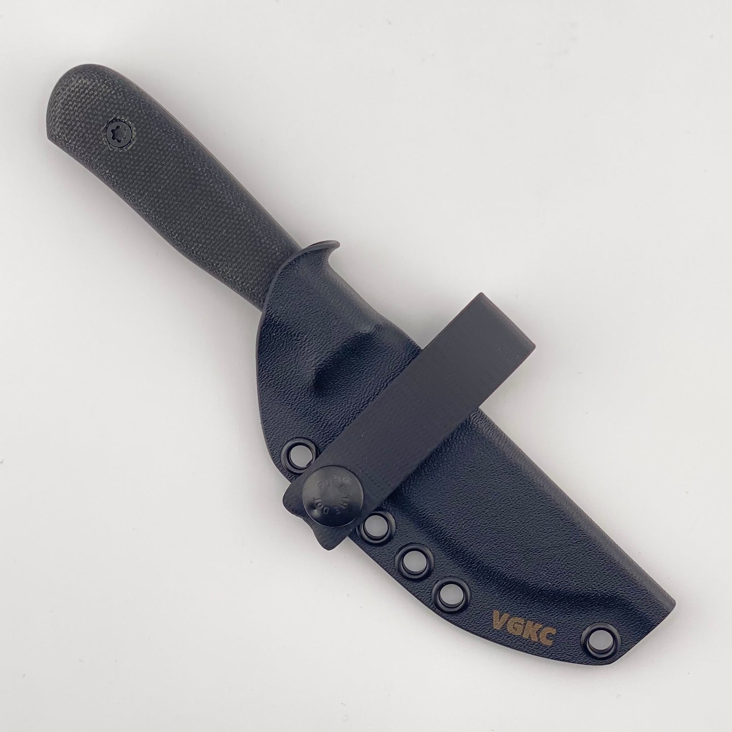 Black handled fixed blade knife in a black sheath