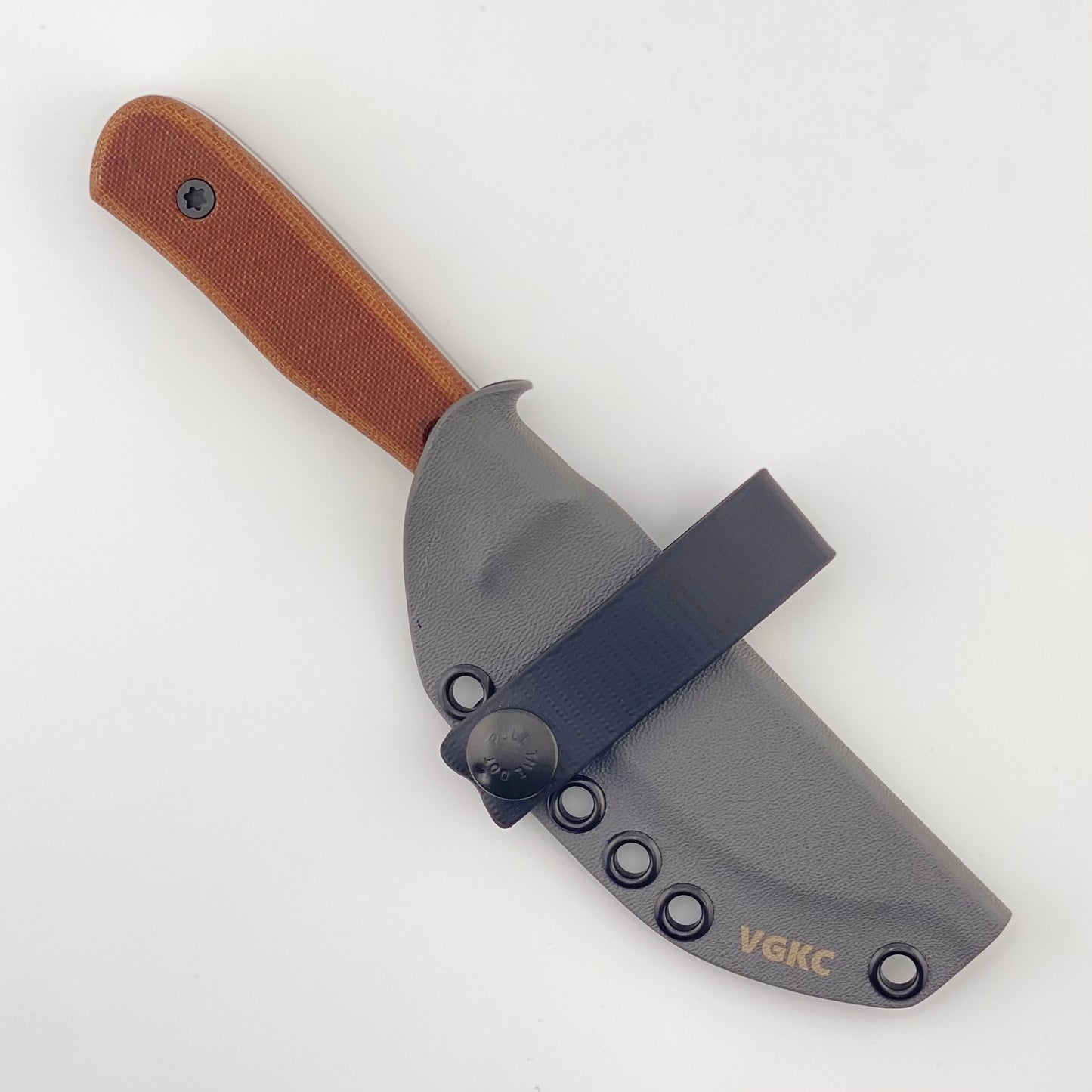 Fixed blade knife with brown handles in a gray sheath with a black strap on a white background