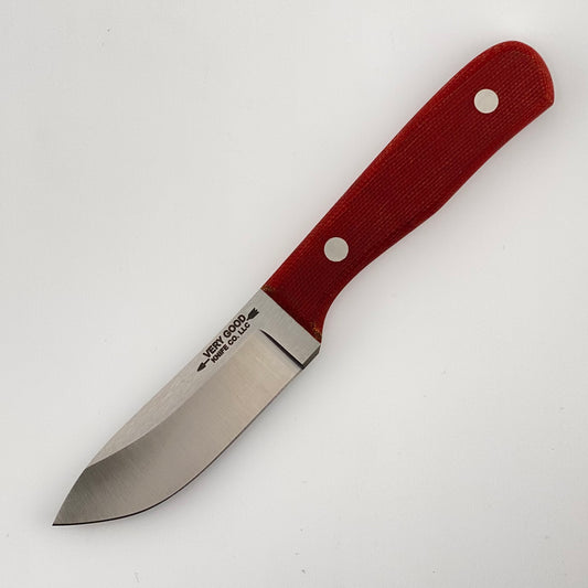 Fixed blade knife with red handles on a white background