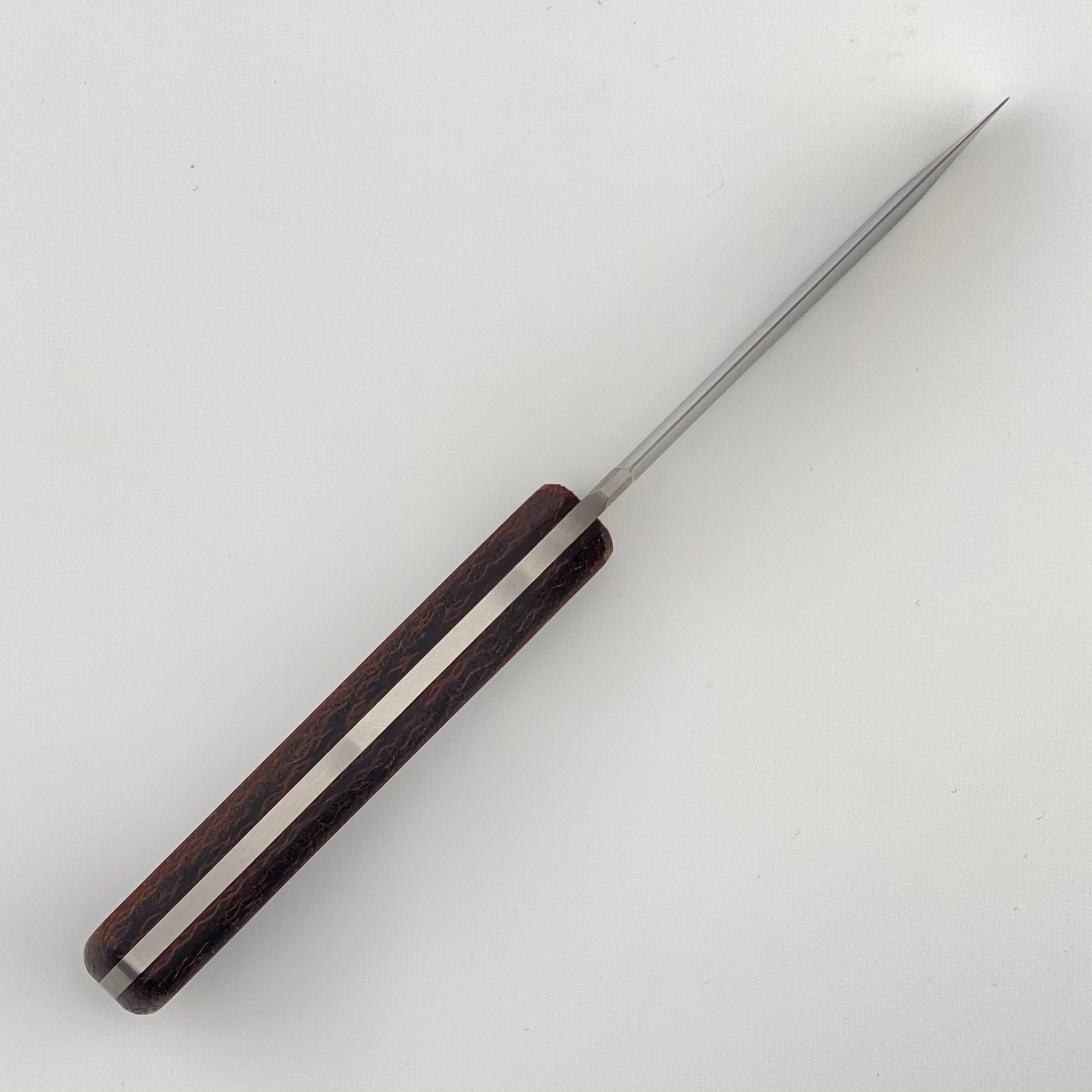Fixed blade knife with brown handles on a white background