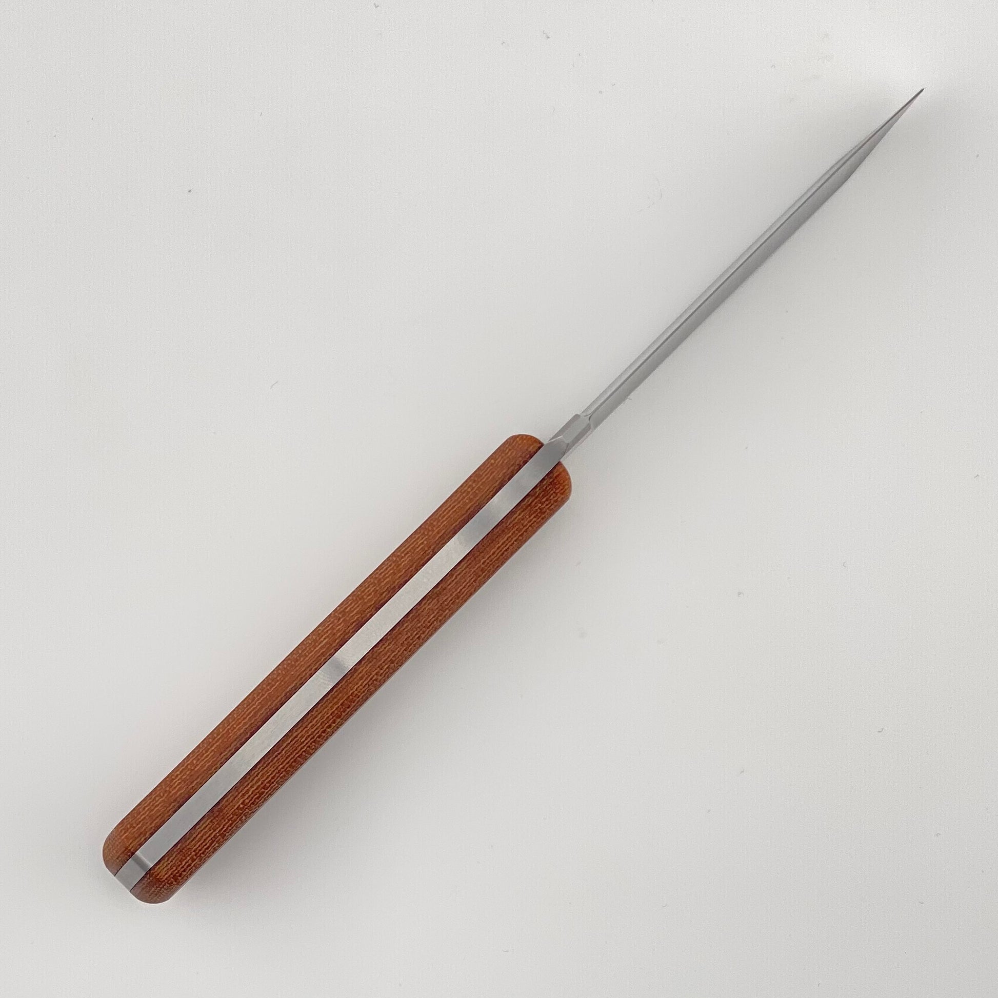 Fixed blade knife with brown handle on a white background