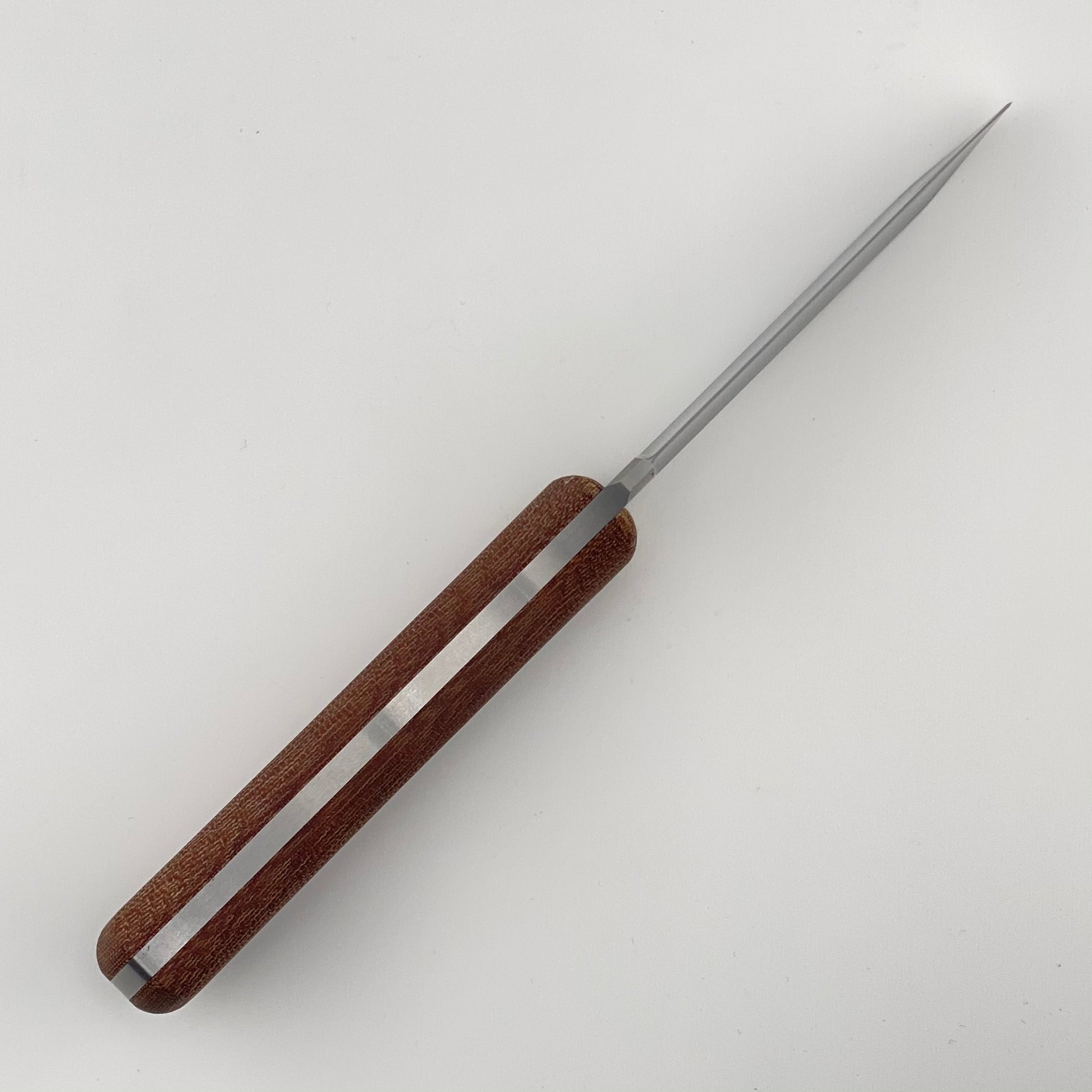 Fixed blade knife with a brown handle on a white background