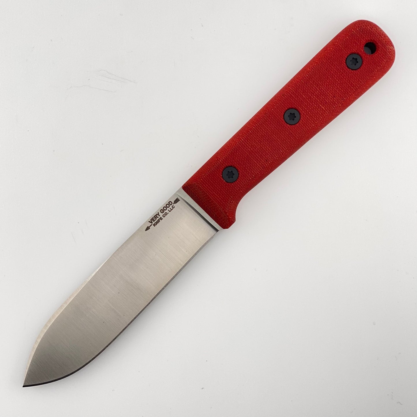 Fixed blade knife with red handles on a white background