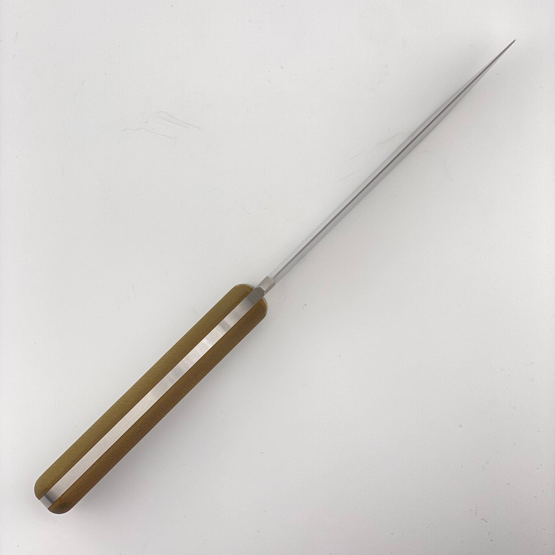 Fixed blade knife with green handles on a white background