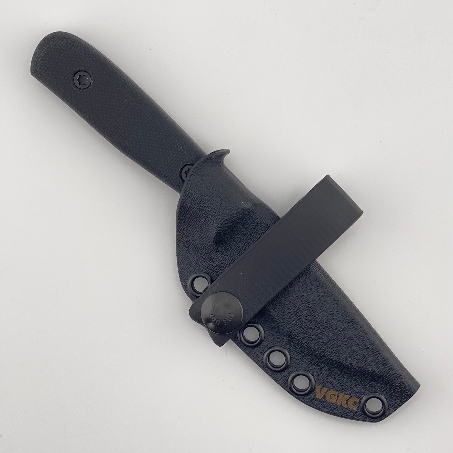 Black fixed blade knife with black handles in a black sheath on a white background