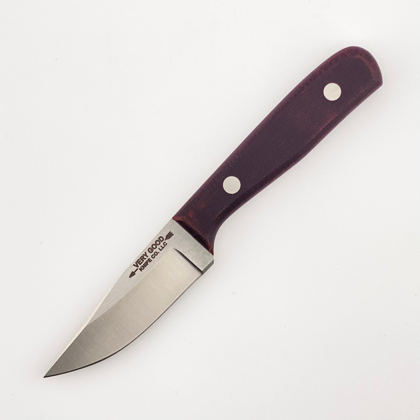 Fixed blade knife with a purple handle on a white background