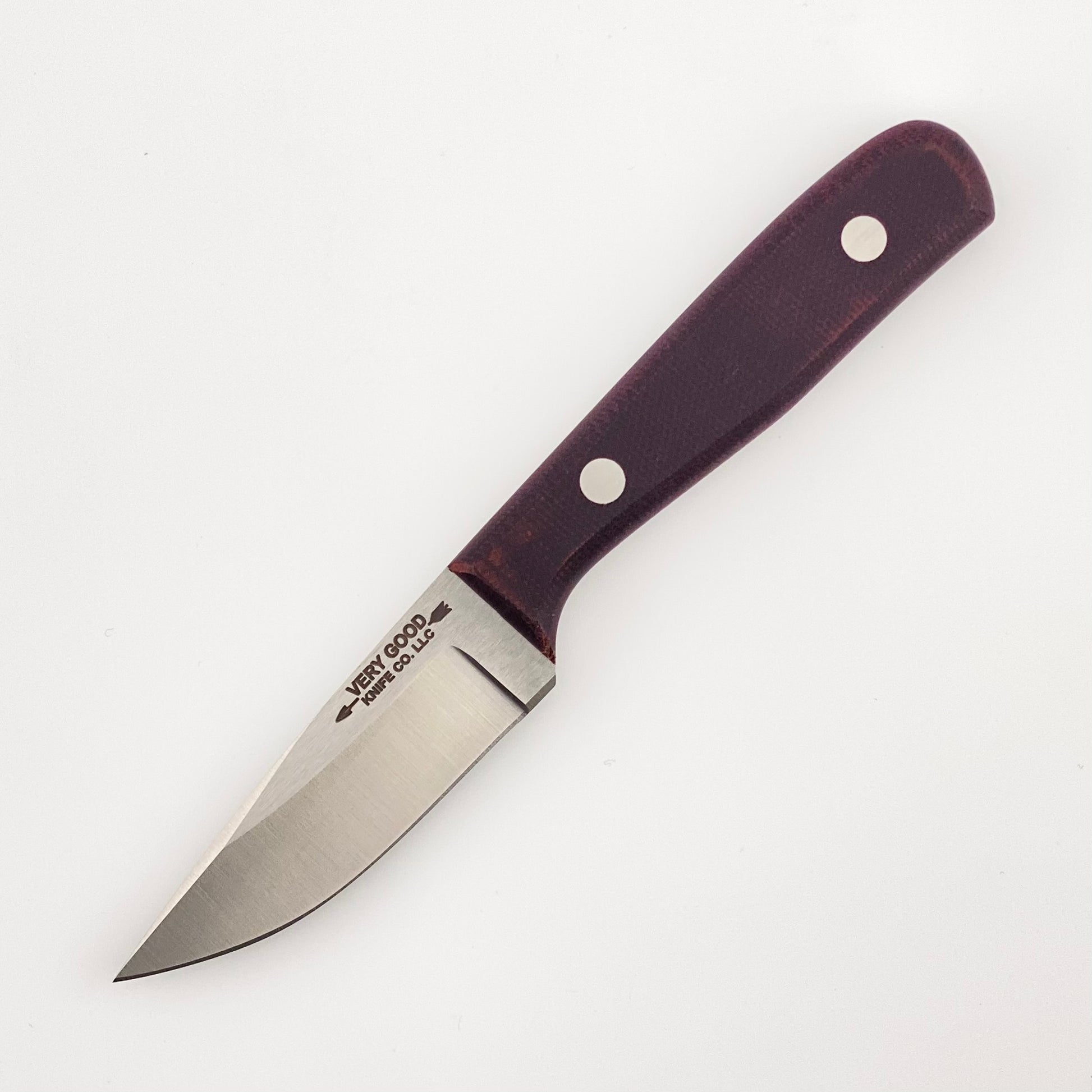 Fixed blade knife with a purple handle on a white background